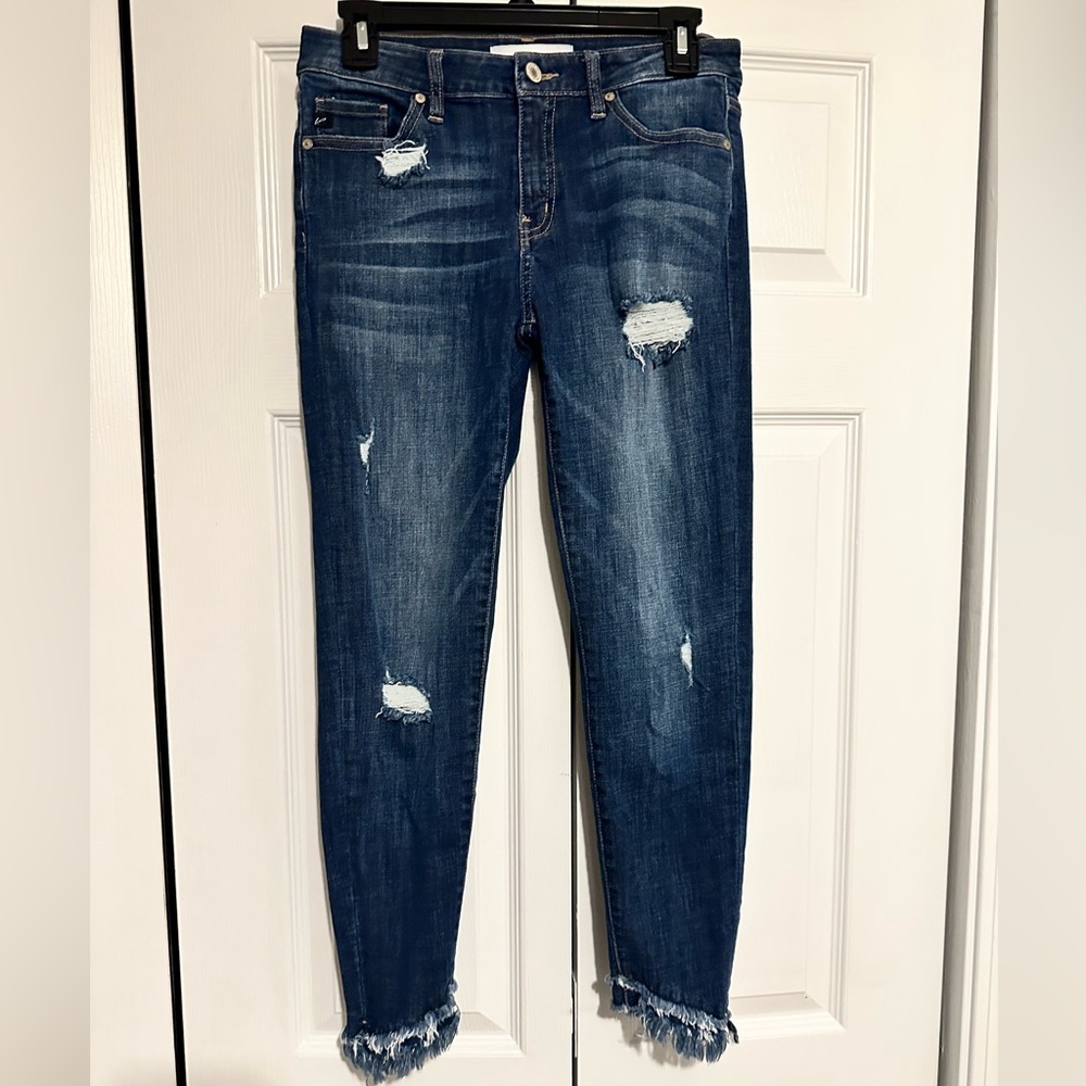 Kancan jeans size 7. Frayed and angled at the ankles. Great condition!